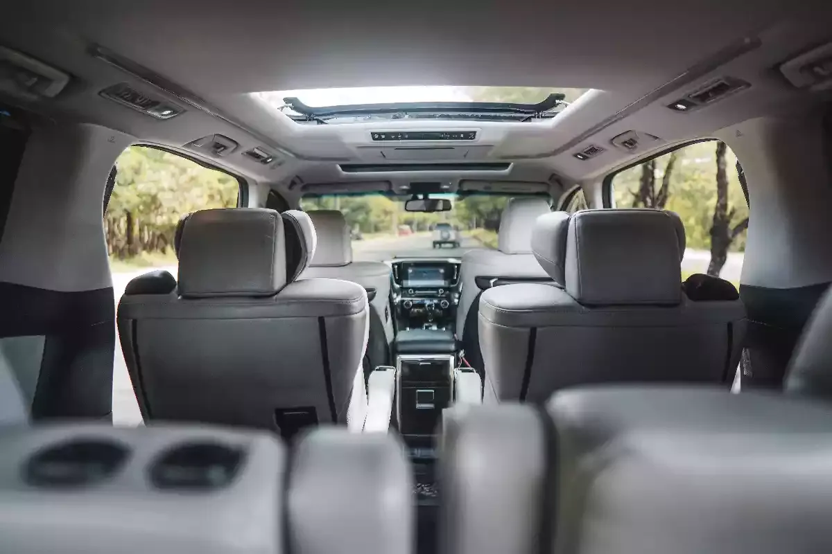 Vellfire cabin seen from the third row looking forward past the captain seats